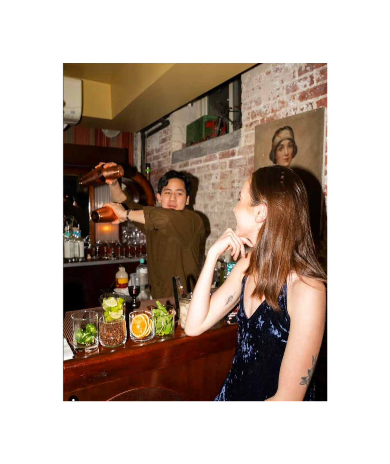 Barman shakes mocktail