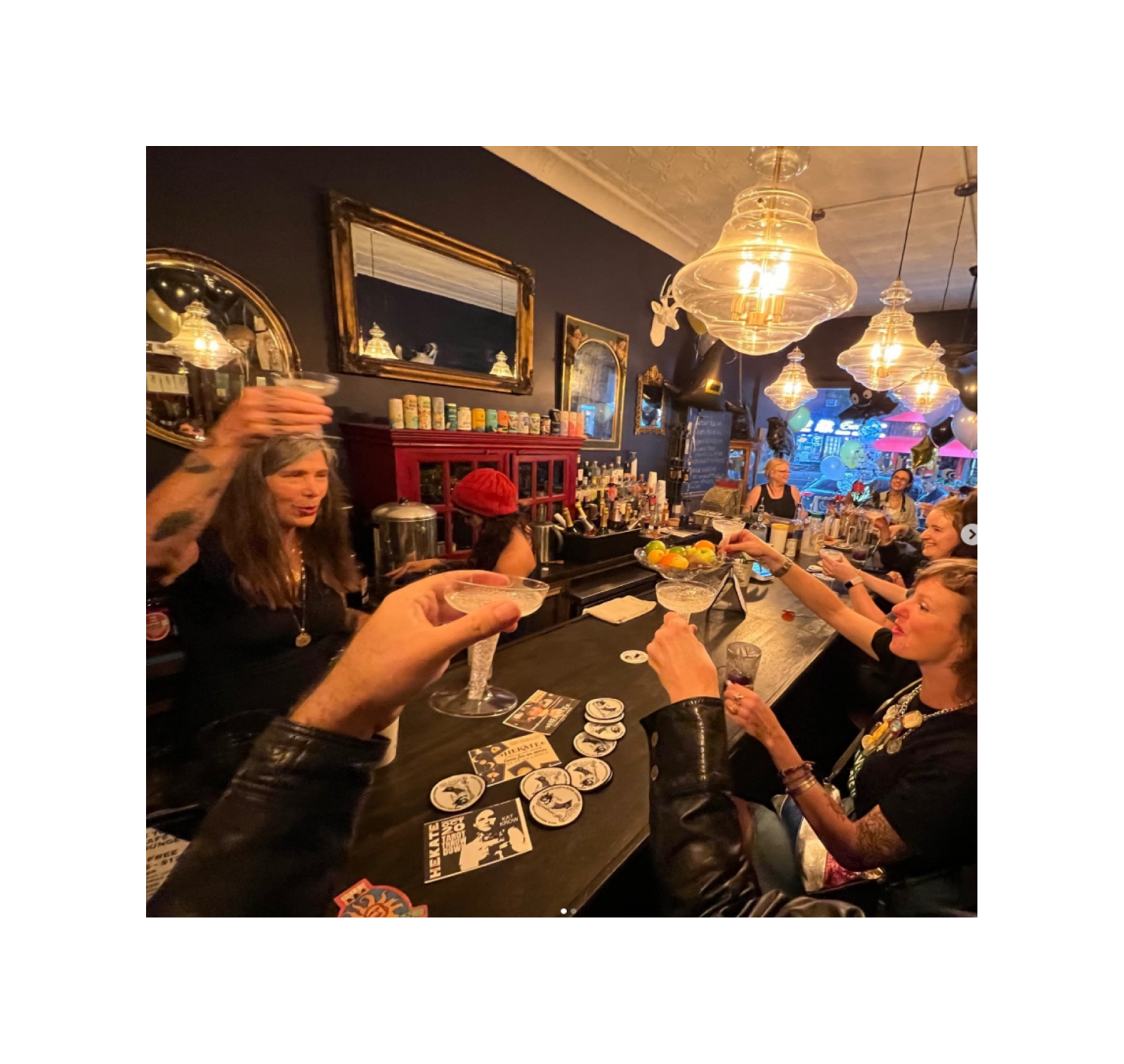 Cheering in busy bar