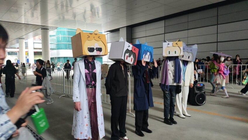Cosplayers wearing Paper Helmets
