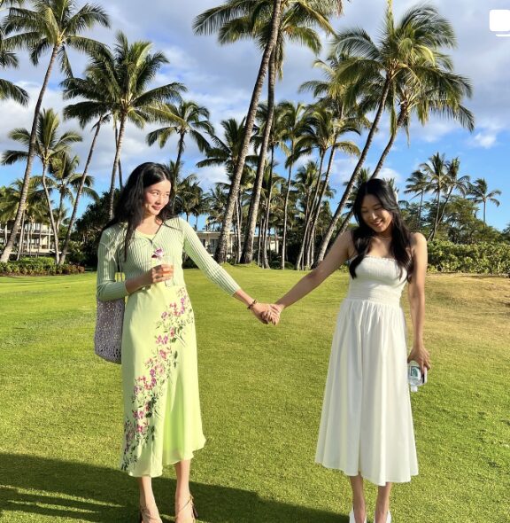 Girls holding hands