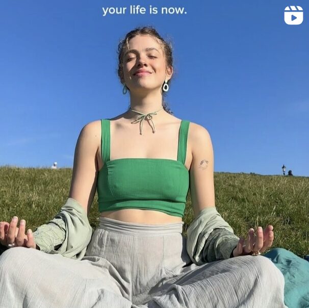 Meditating in field