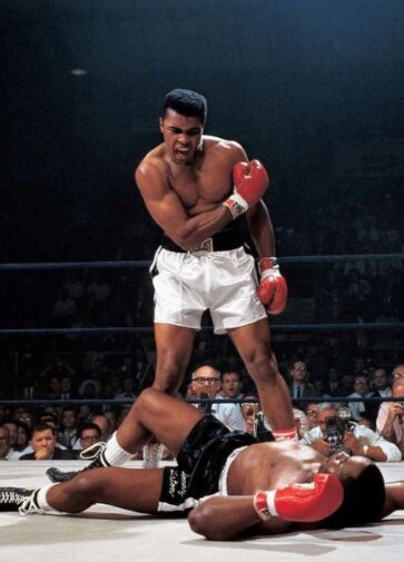Mohammed Ali defeating his opponent