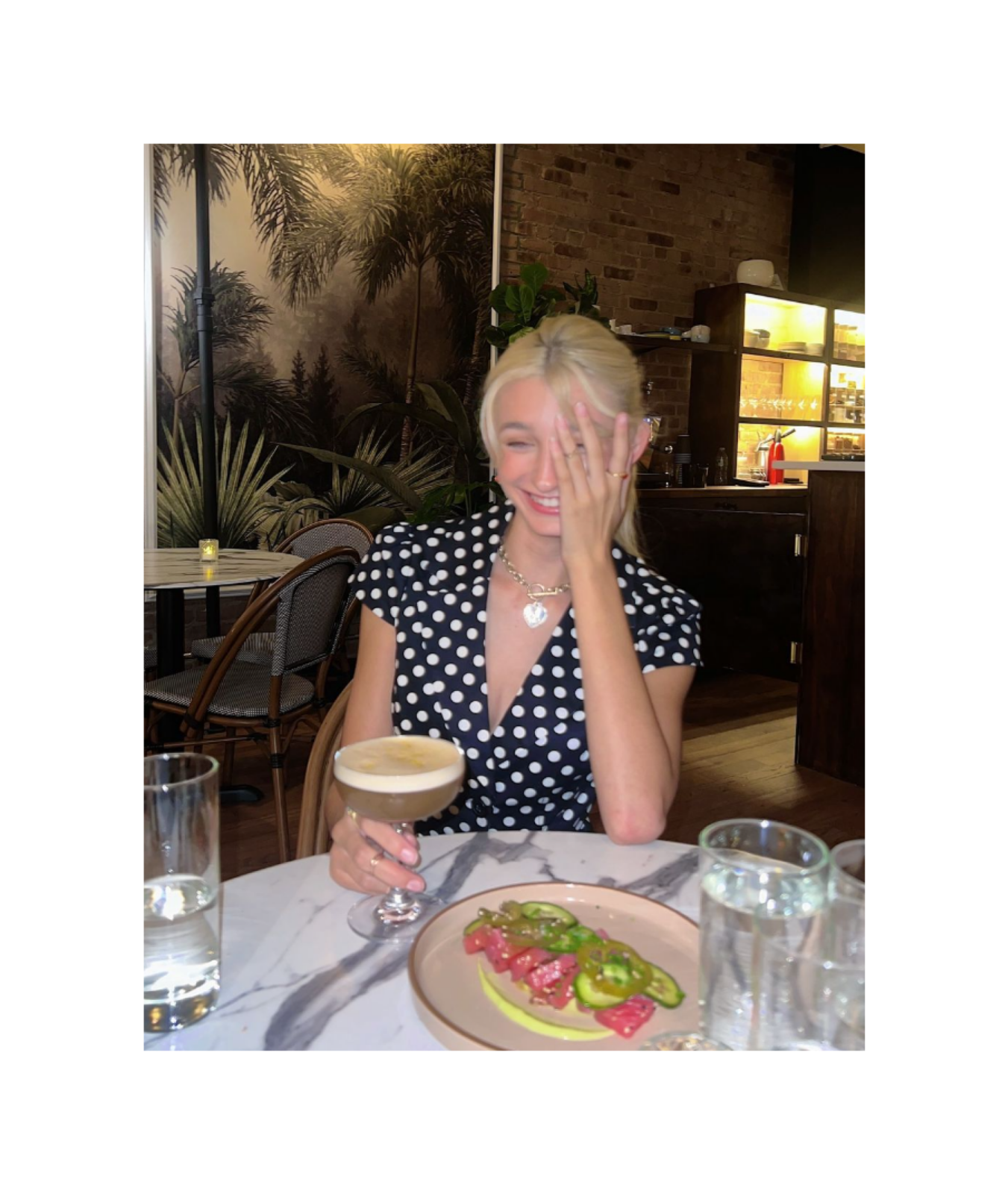 Posing with mocktail hiding face