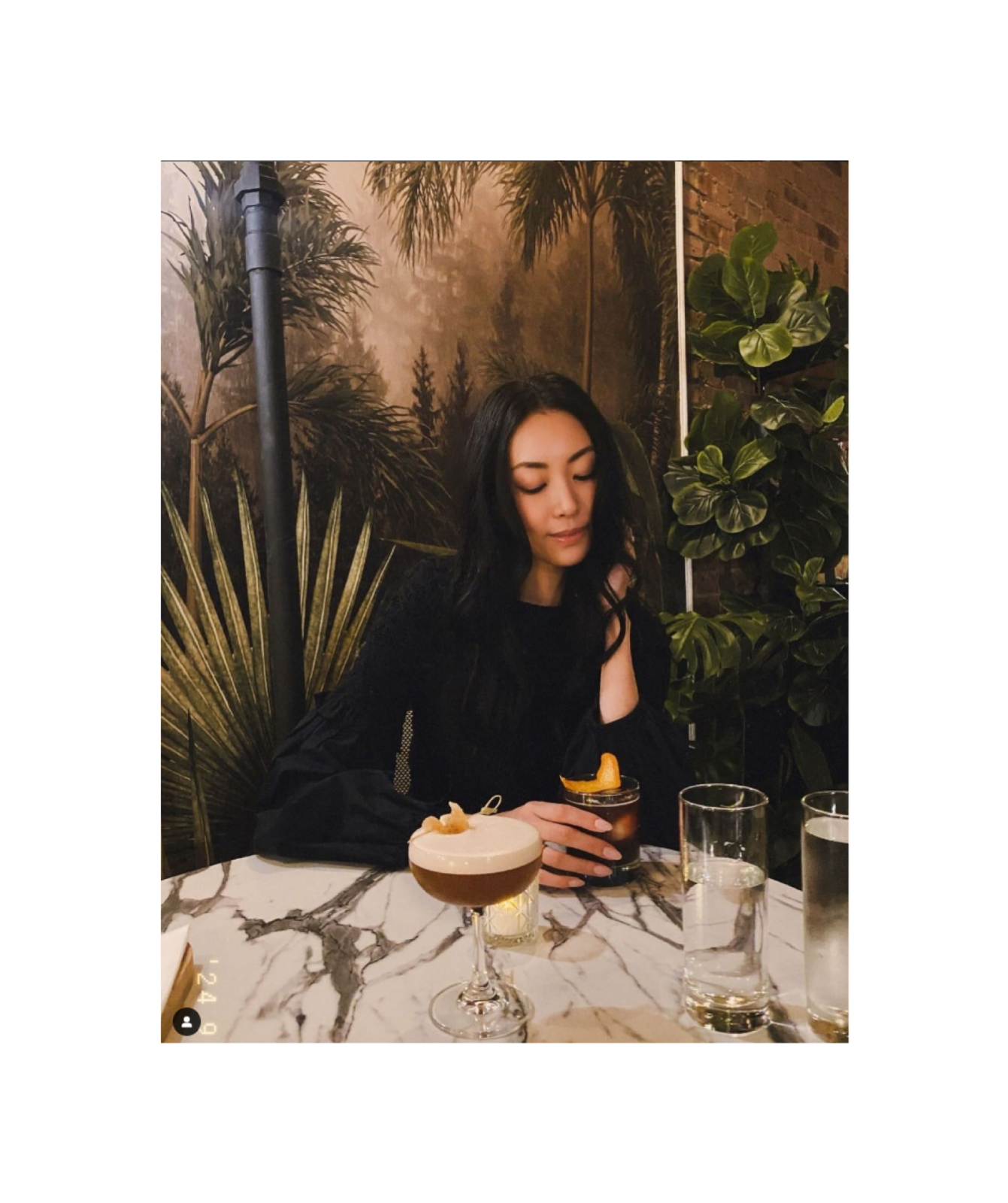 Posing with mocktail look away