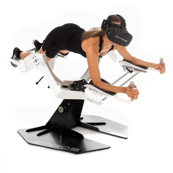 Woman using futuristic fitness equipment