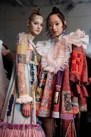 duo posing colorful