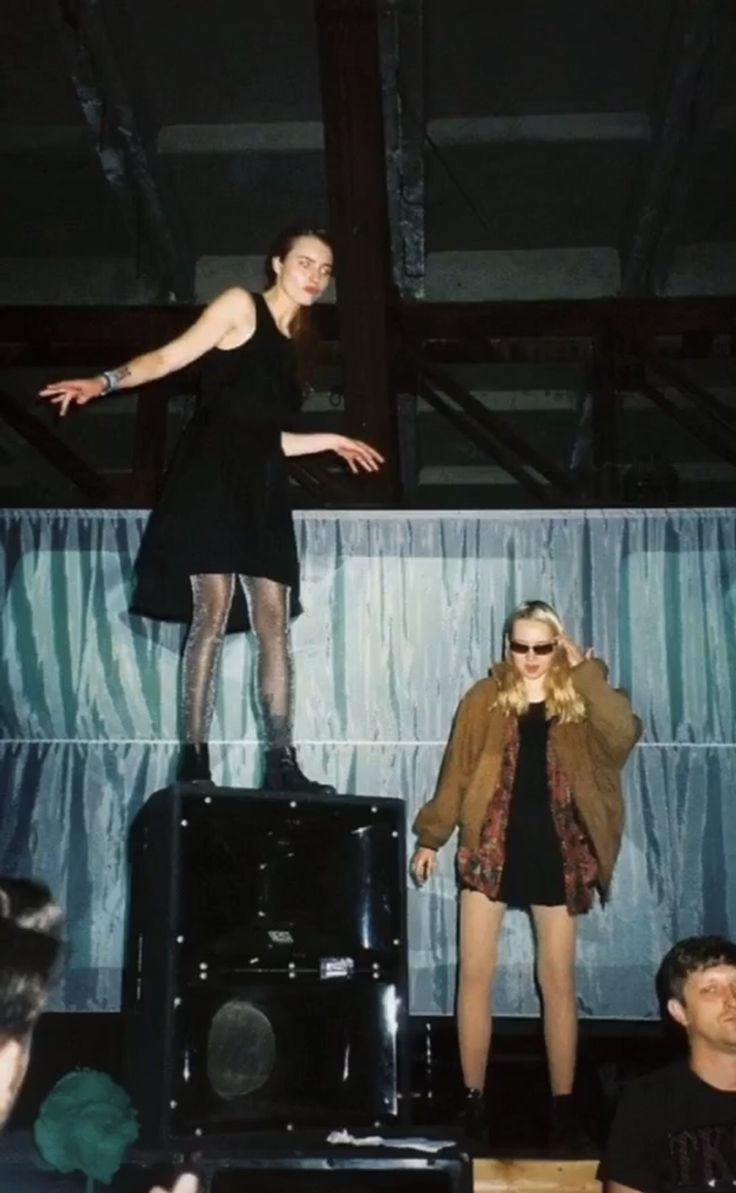 girl standing on amplifyer