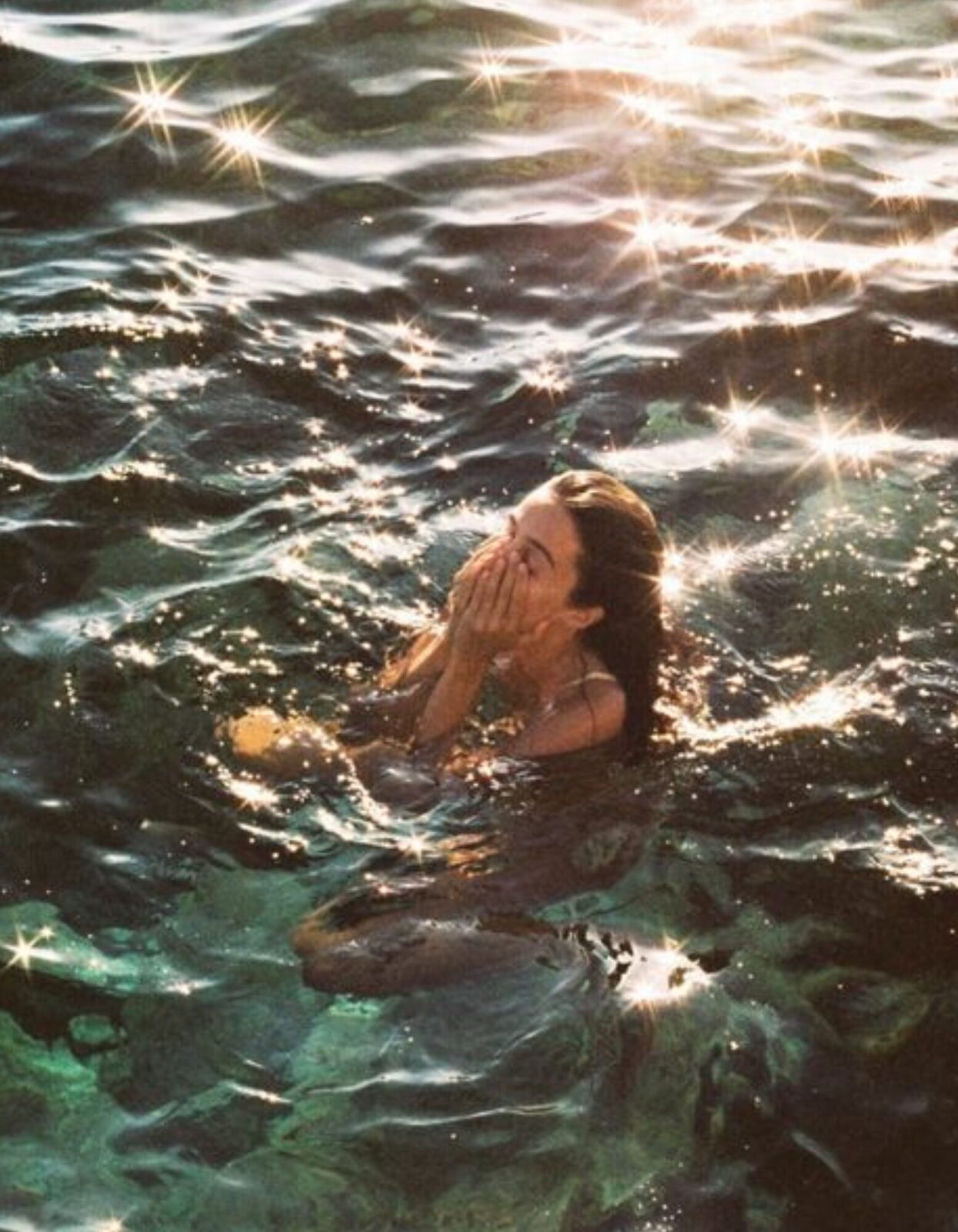 girl-washing-face-water
