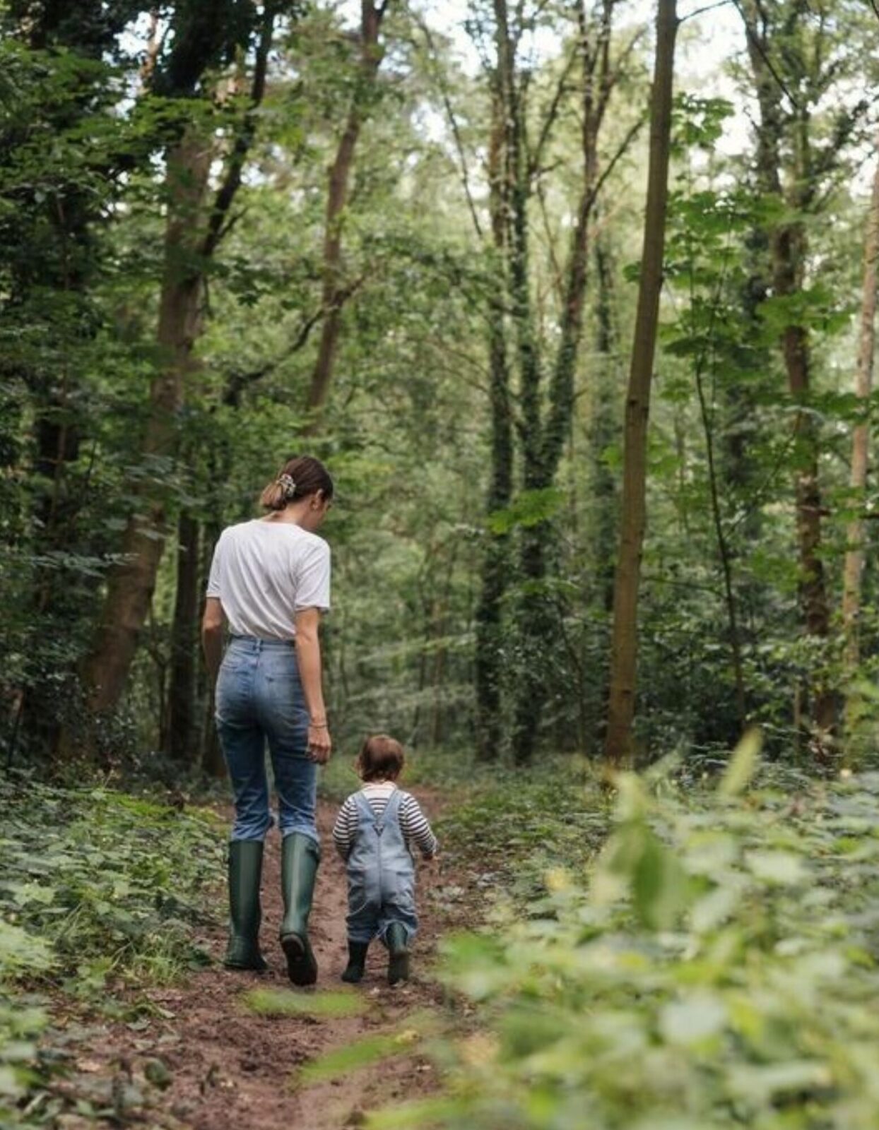 woman-child-walking-forest